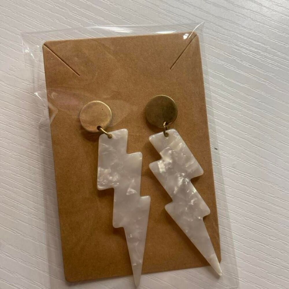 White lightning bolt earrings